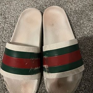 Used White Gucci slides, men’s size 12